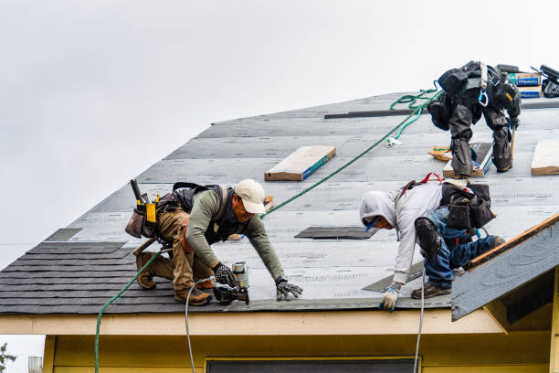 Professional Emergency Roof Repair technician working in Fredericksburg, OH